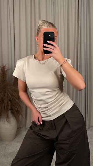 Lucc shoulder-pad bolur beige